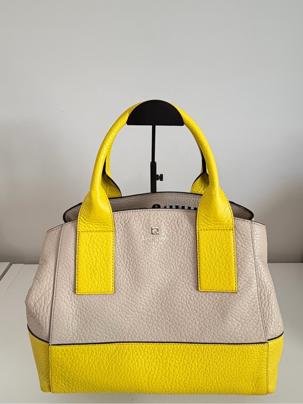 Kate Spade Cream and Yellow Pebbled Leather Satchel with Striped Lining